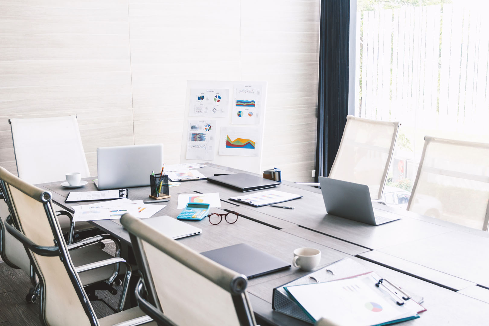 Business meeting and conference room with laptop and business do